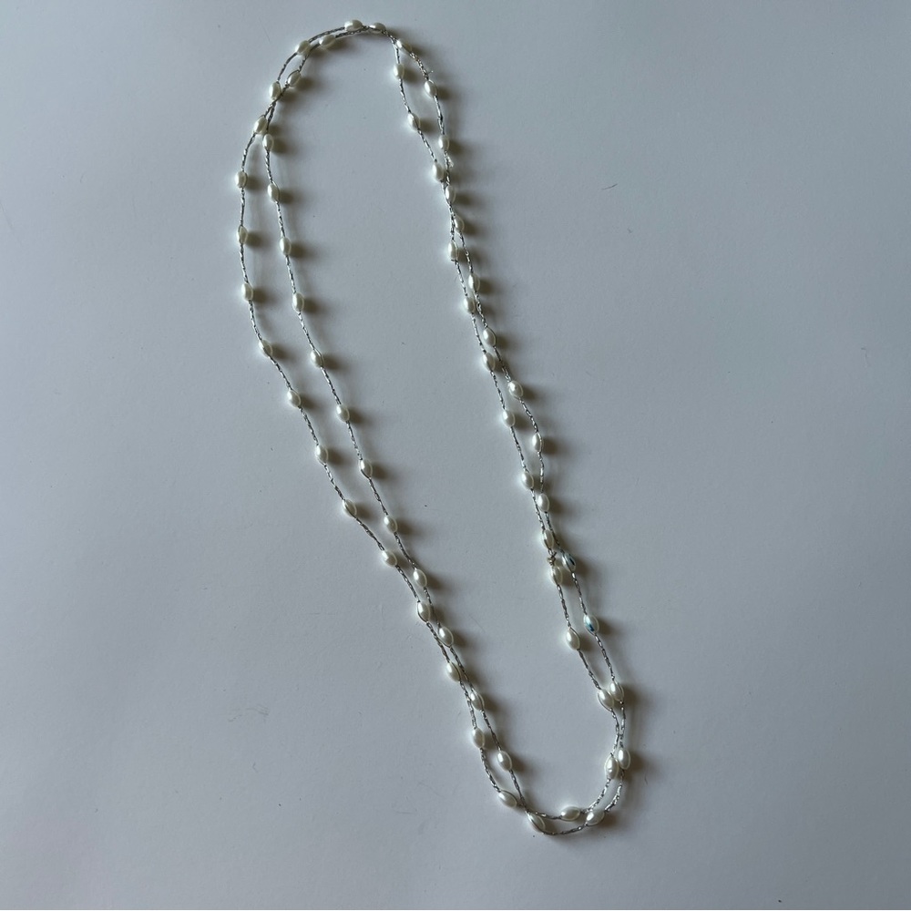 Silver Twine Embracing Pearlescent Pebbles J30